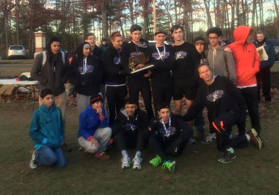 Under the guidance of Coach Reinhart, the HHS Cross Country team won Western Mass this year! 