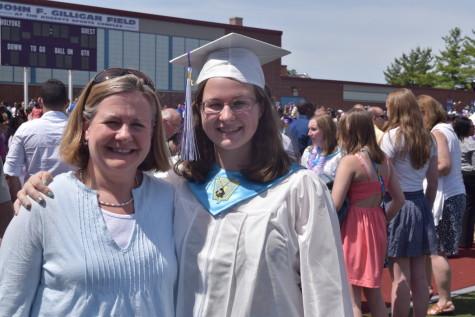 Valedictorian Erin Hebert and her mom Holyoke High English teacher Mrs. Hebert share a moment.