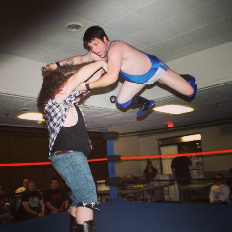 Holyoke High alum Bill King launches off the top rope onto an unsuspecting opponent. 