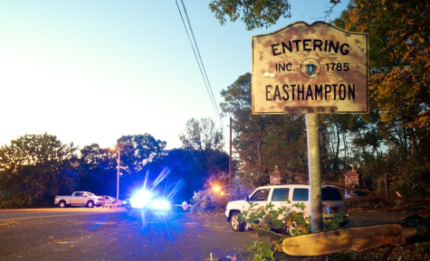 Emergency responders close off Mountain Road due to the damage.