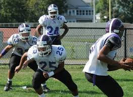 The Holyoke Knights practice. Come out this Thanksgiving and show your purple pride!
