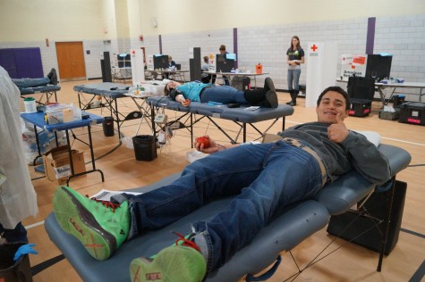 Holyoke High student Lissandro Diaz does his part.