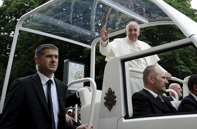 Pope Francis waves as he leaves at the end of his two-day pastoral visit in Turin, Italy, on June 22, 2015.  Photo courtesy of REUTERS/Giorgio Perottino *Editors: This photo may only be republished with RNS-POPE-USTRIP, originally transmitted on June 30, 2015.