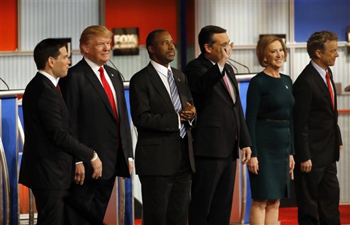 Republican presidential candidates John Kasich, Jeb Bush, Marco Rubio, Donald Trump, Ben Carson, Ted Cruz, Carly Fiorina and Rand Paul take the stage during Republican presidential debate at Milwaukee Theatre, Tuesday, Nov. 10, 2015, in Milwaukee. (AP Photo/Morry Gash)