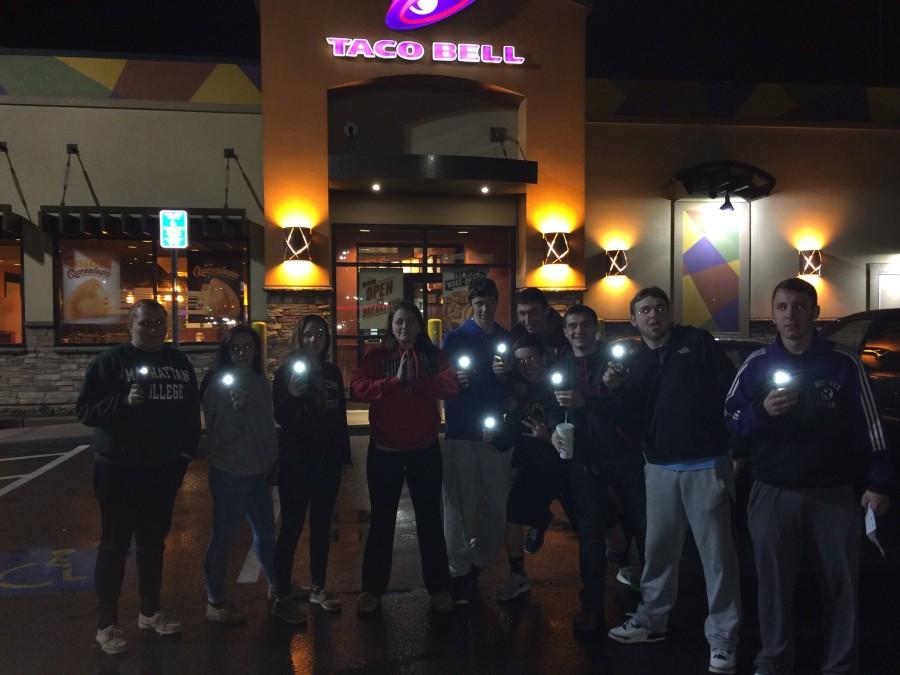 Friends gather outside Taco Bell in a touching tribute to poor Maeghan. 