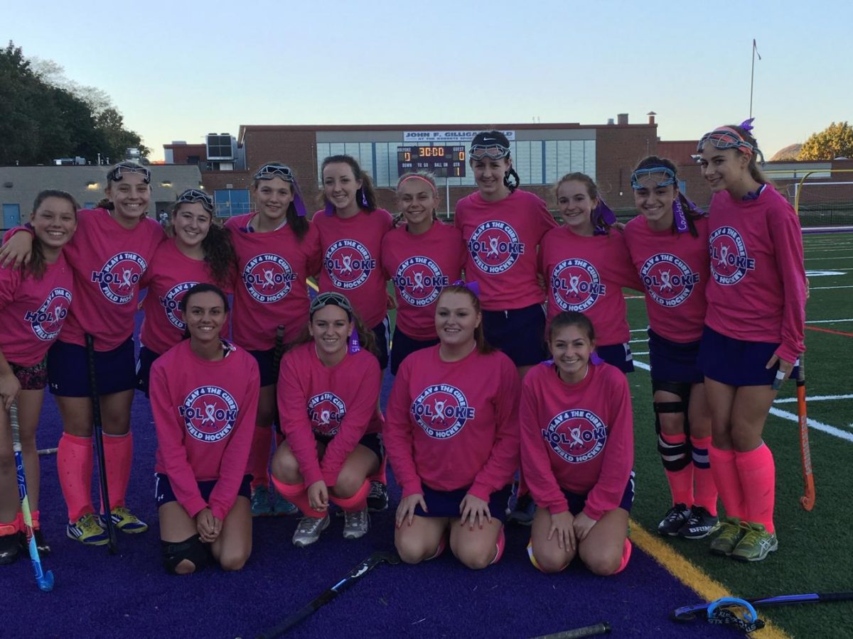 Field Hockey team photo from a past Play for the Cure game.